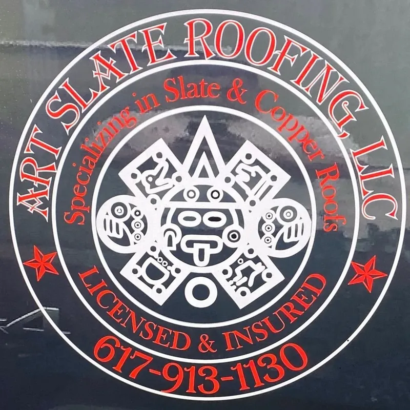 The Art Slate Roofing, LLC logo with the phone number 617-913-1130 on the side of the company truck